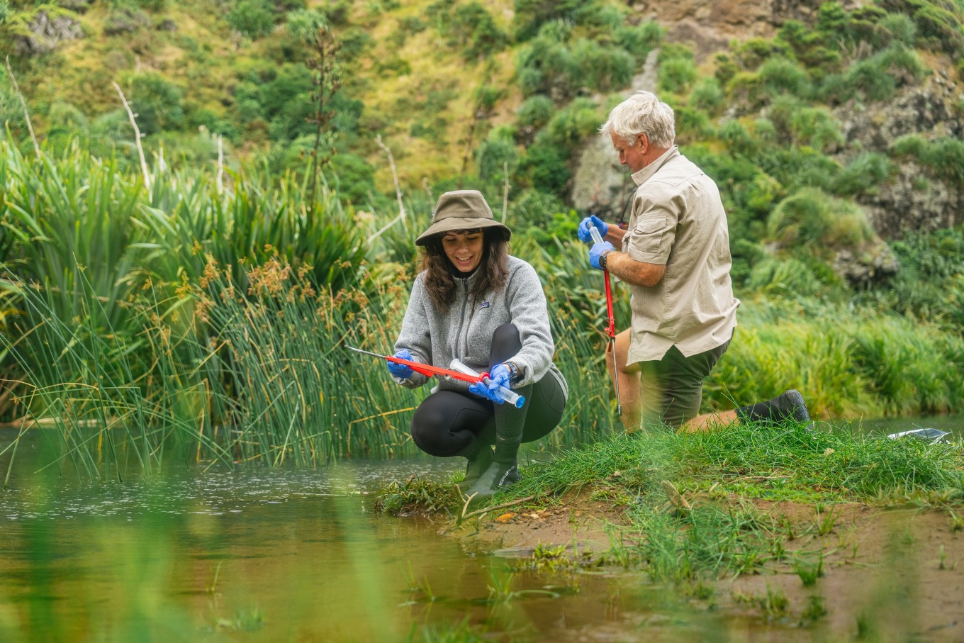 Auckland Council freshwater ecologists Rose Gregersen and Matthew Boxham have been taking eDNA (environmental DNA) freshwater samples at Pararaha Valley, near Karekare, which is classed as one of the region's most outstanding wetlands.
