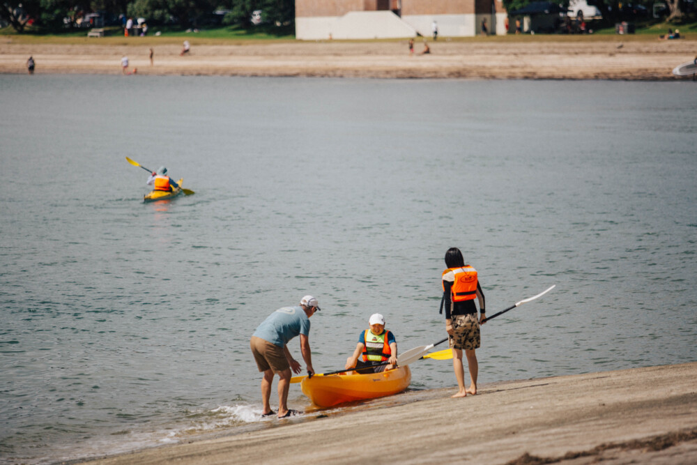 People kayaking in Ōkahu Bay