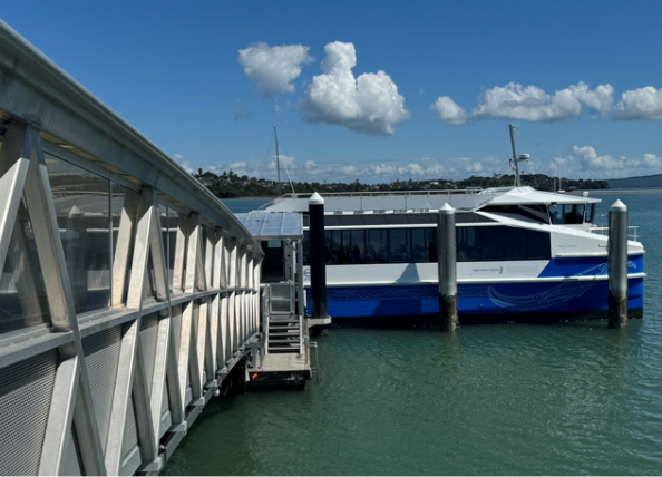 A ferry docked at port. 