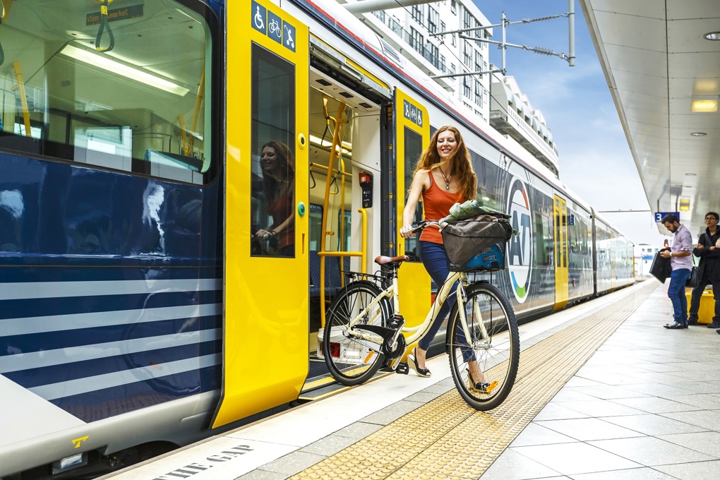 Getting off train with bike