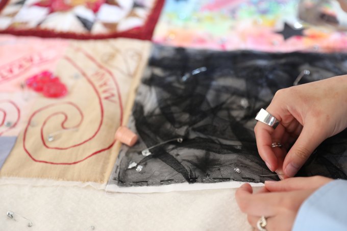 QJ hand stitching resized_ymqk04b5.jpg