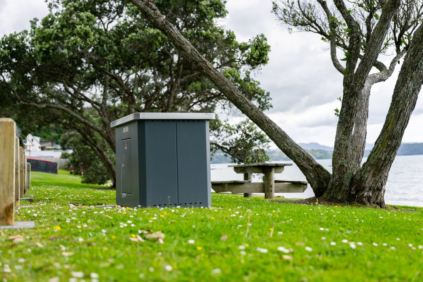 Algies Bay Reserve features an electric barbecue with a picnic table at arm’s length.