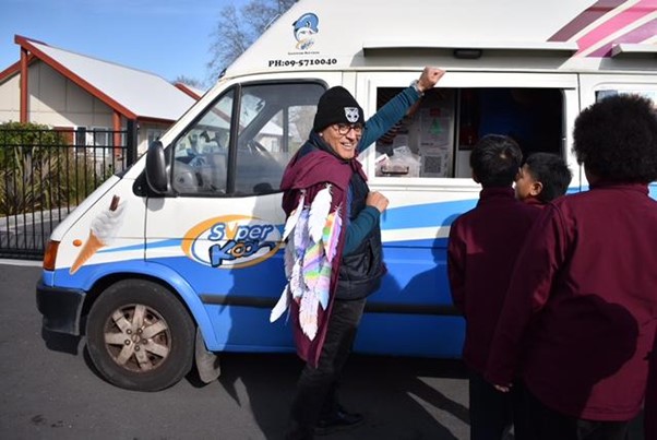 Ice cream truck feeding local community.