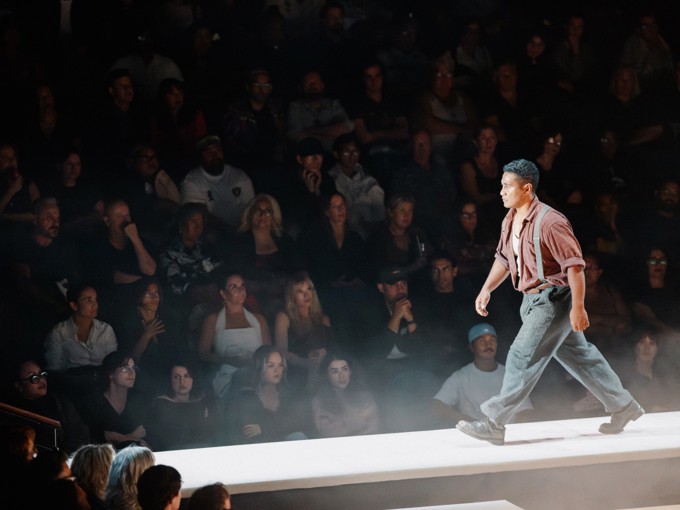 A Person Walking The Runway