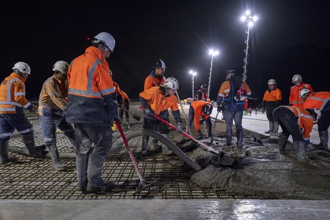 A Concrete Roof Pour Taking Place Over Night.