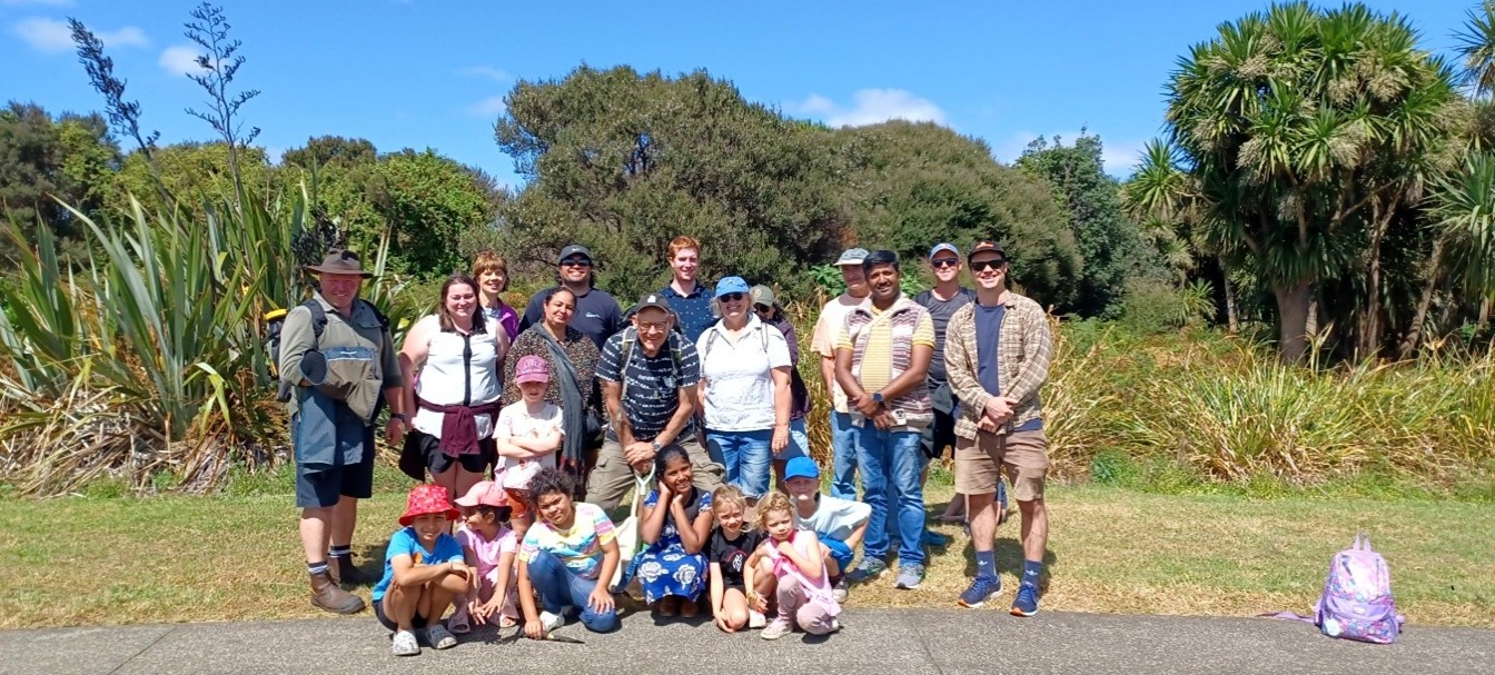 A group photo of people in the natural environment. 
