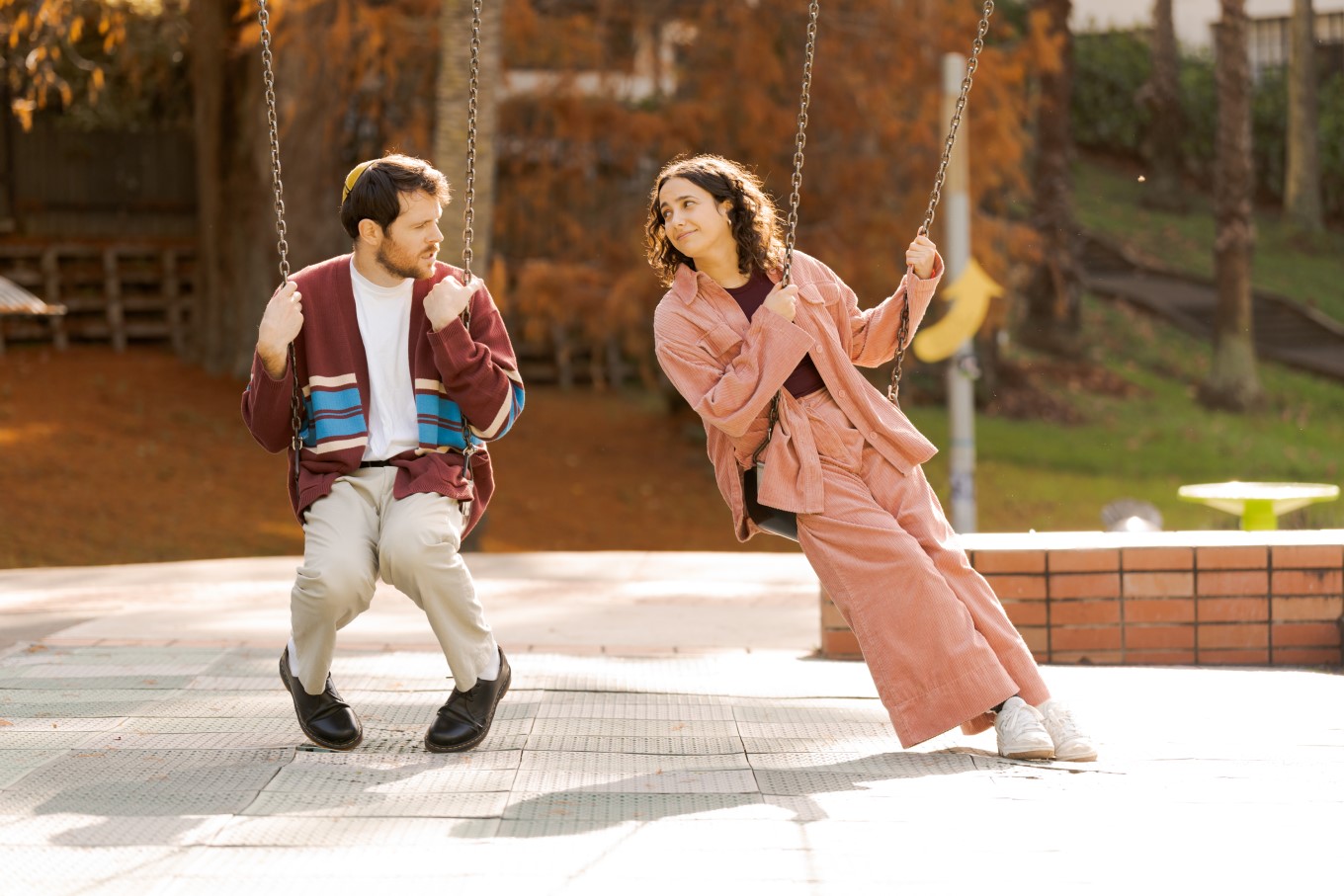 Paul Williams and Simone Nathan filming Kid Sister on the playground in Myers Park. Photograph: Mel Nicholson.