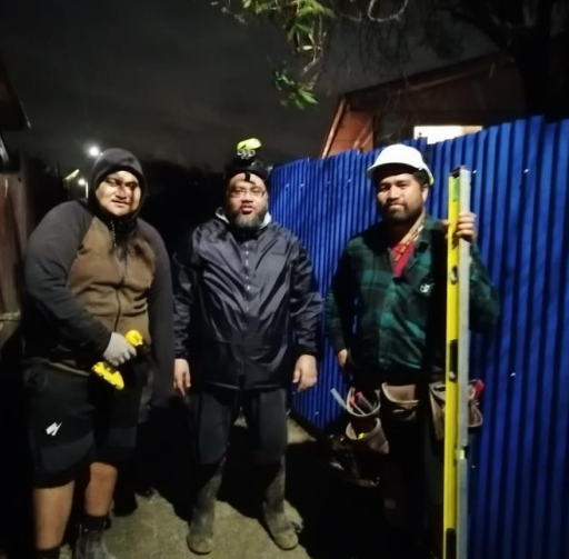 Members of Jenna’s family who built the fence