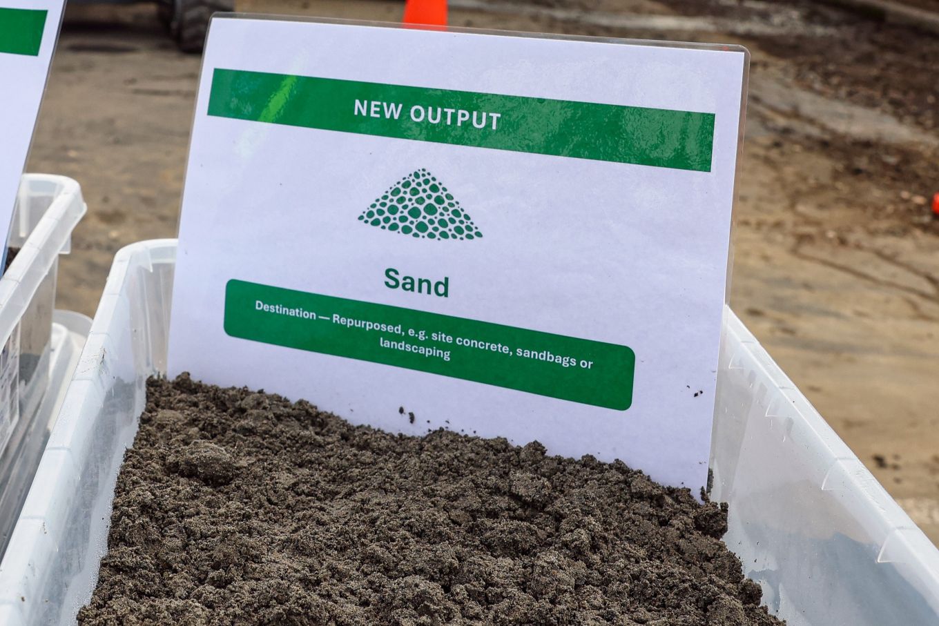 Close up of sand in a white container