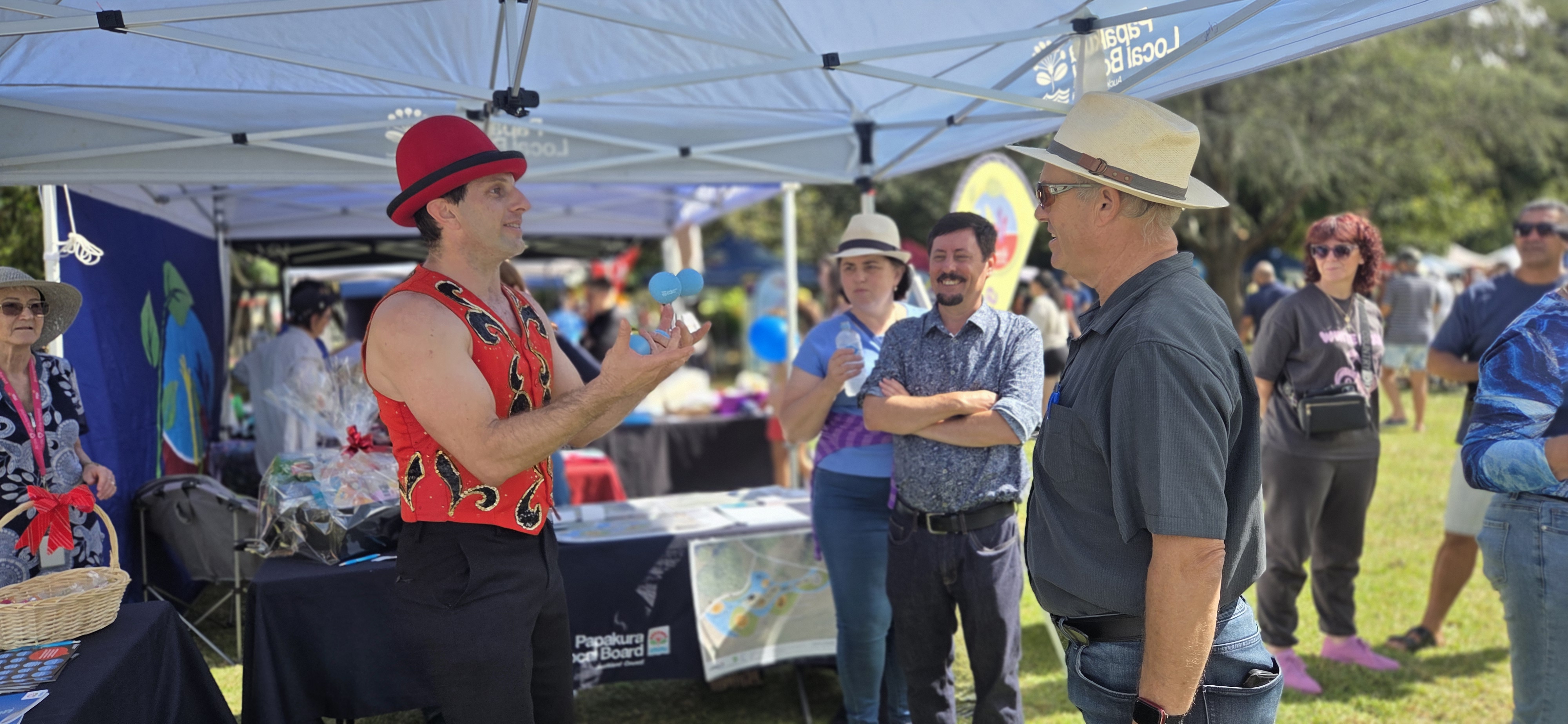 Entertainer juggles at local community event