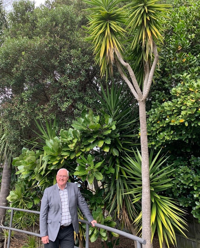 Scott Milne enjoying the greenery provided by large tree's in the local board area