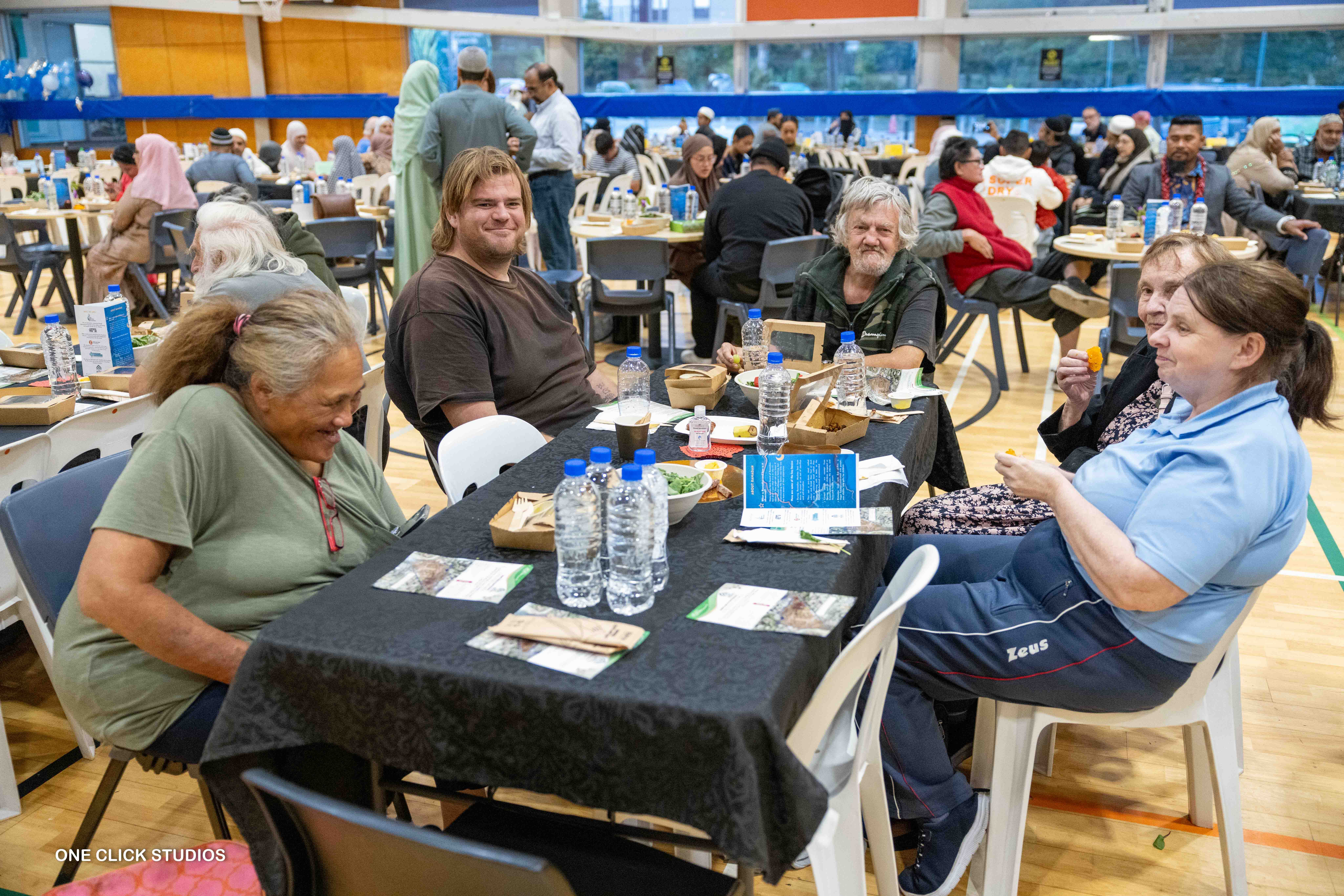 Enjoying the community dinner. Image: Tōia Library.