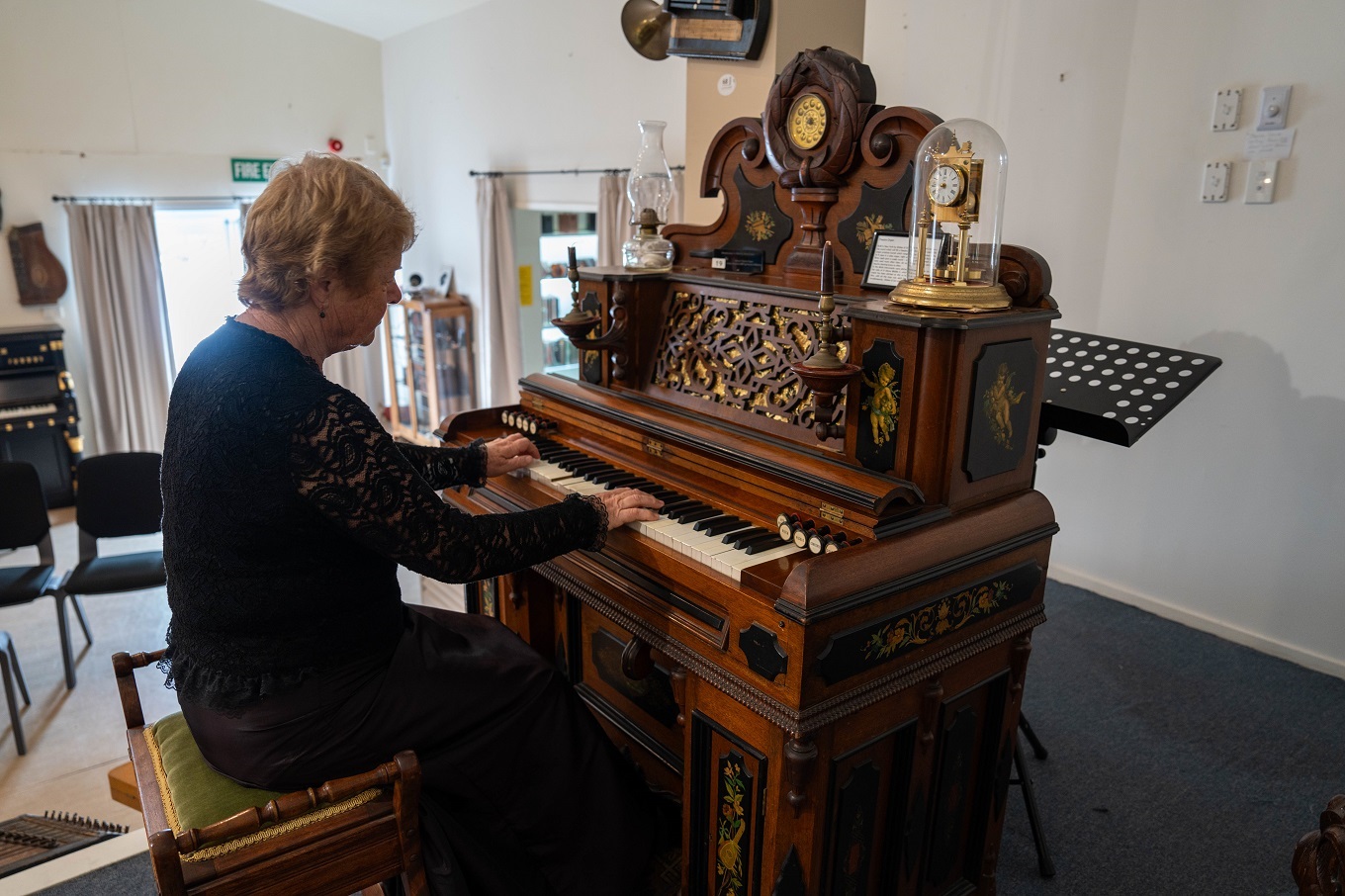 Women playing the piano.