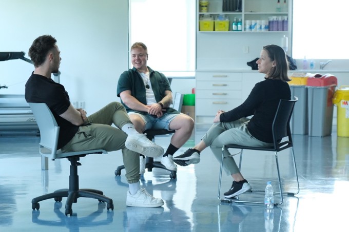Rhion Munro (Centre) With Trainers During Pilot
