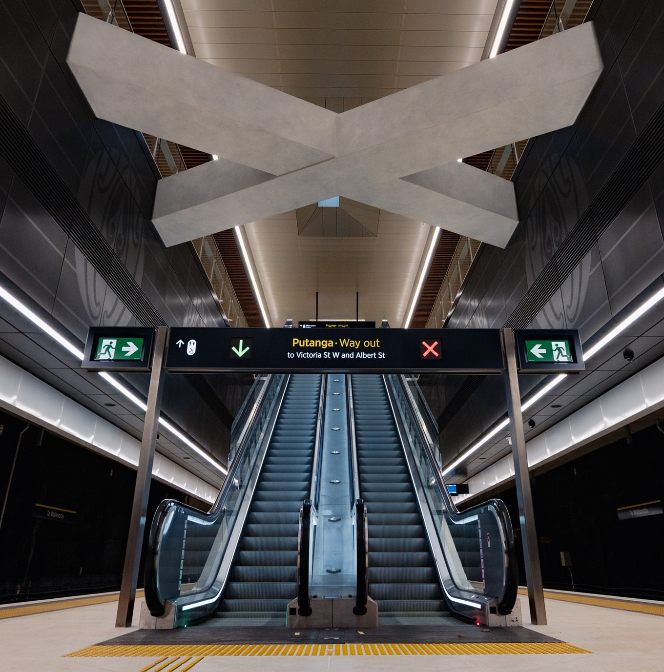 An escalator at a train station. 