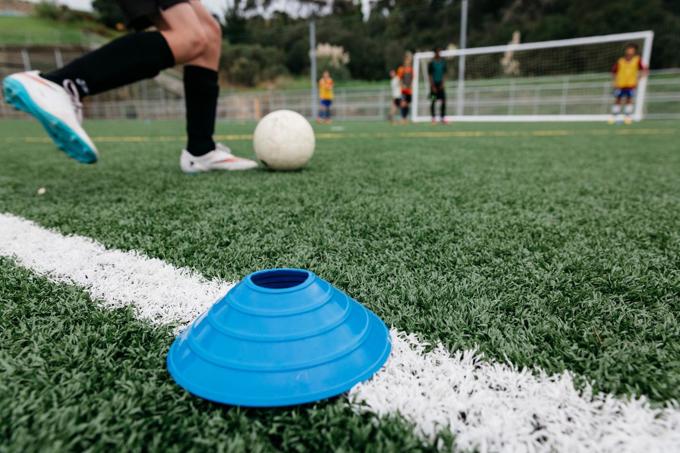 Field kicker playing soccer