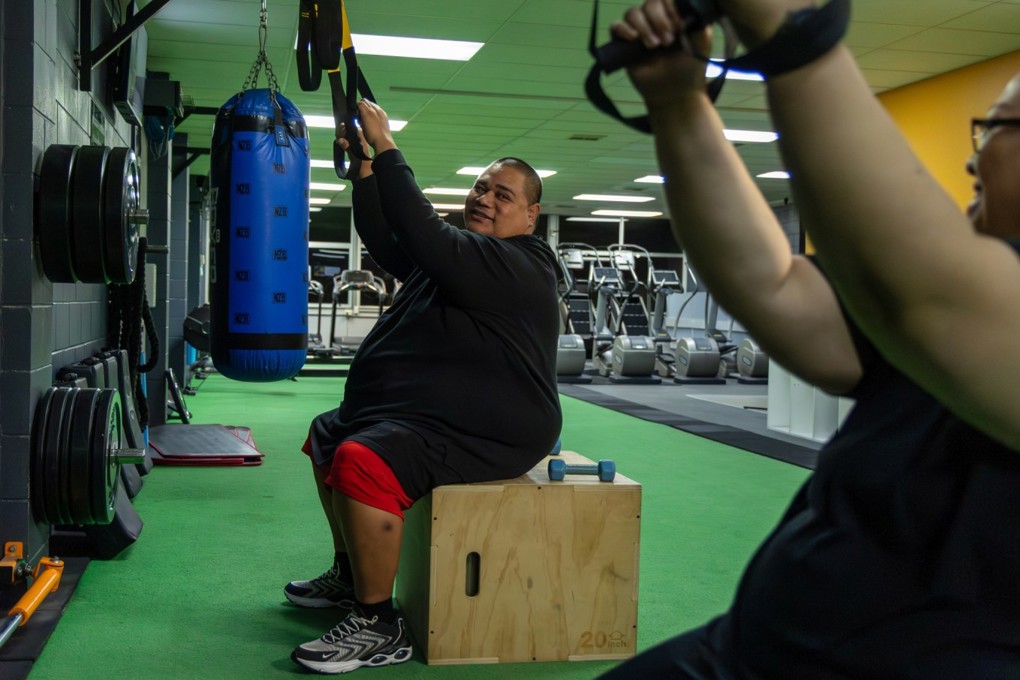 Diabetes Patients Exercising At Gym