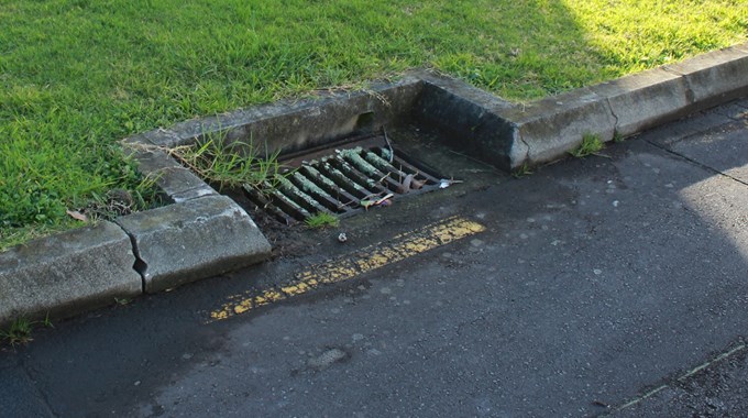 Kids told to stay safe around manholes and drains