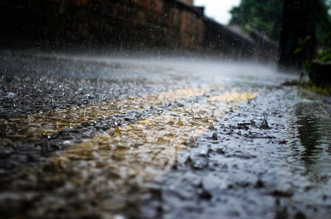 Raindrops On Road Stock Image