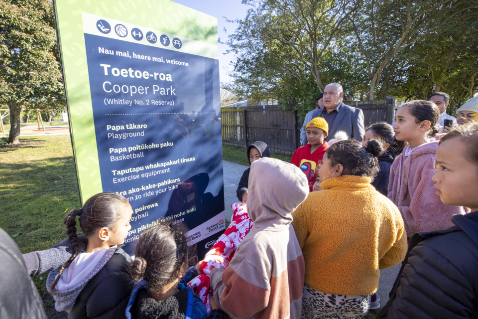 Local kids unveiled the sign as mana whenua gifted Cooper Park its māori name 'Toetoe-roa'