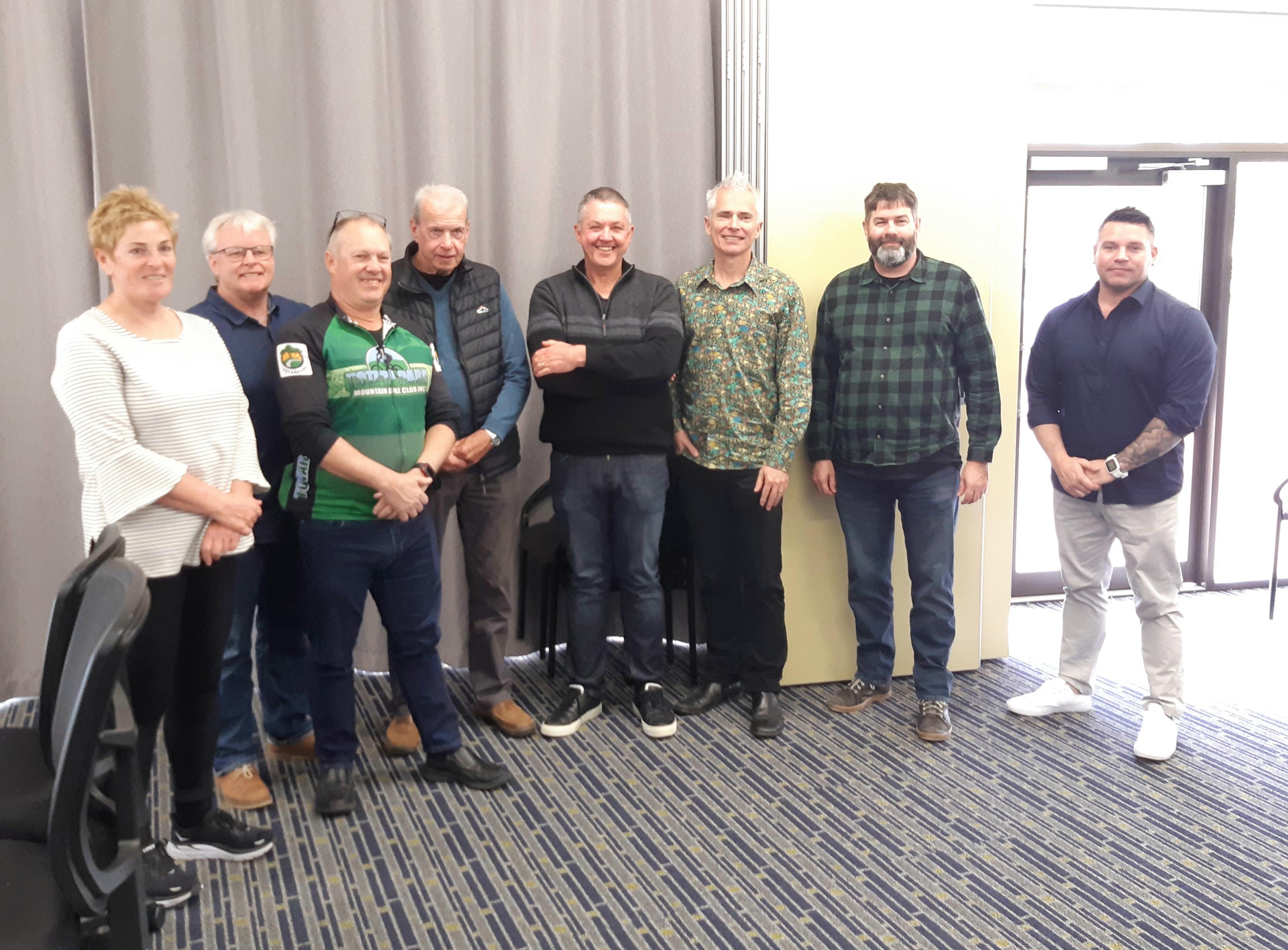 Board and club members celebrate a deal that will see riders working with Council to further develop facilities within Totara Park.