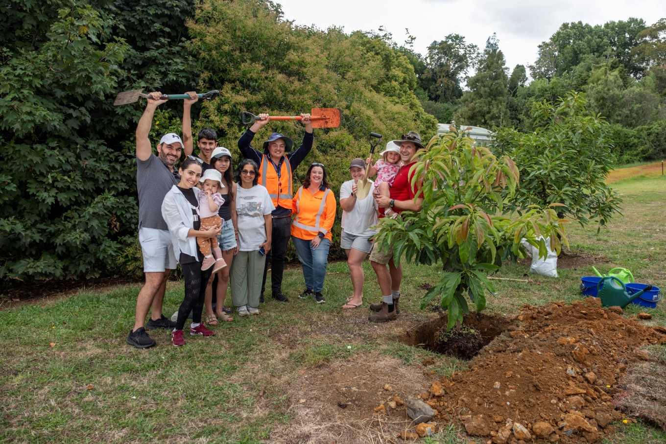 Pukekohe Resident Matthew Gouge (Far Right) Donates An Avacado Tree To The Community Orchard That Sits Behind The Pukekohe Water Treatment Plant