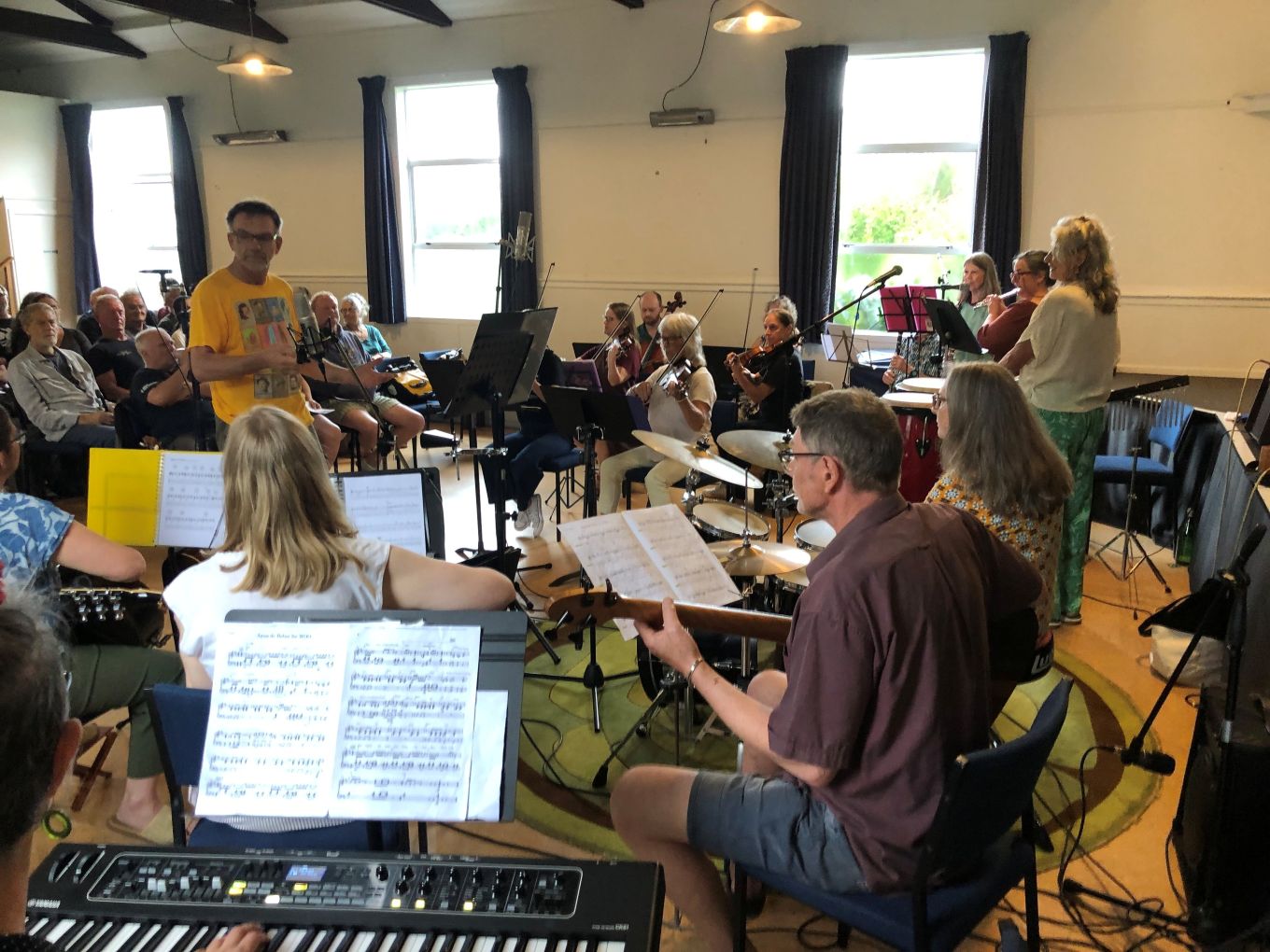 A group of musicians playing instruments together.