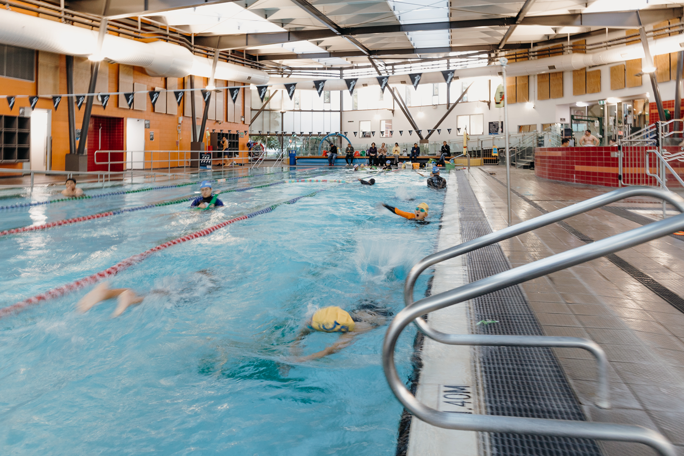 People moving in a swimming lane. 