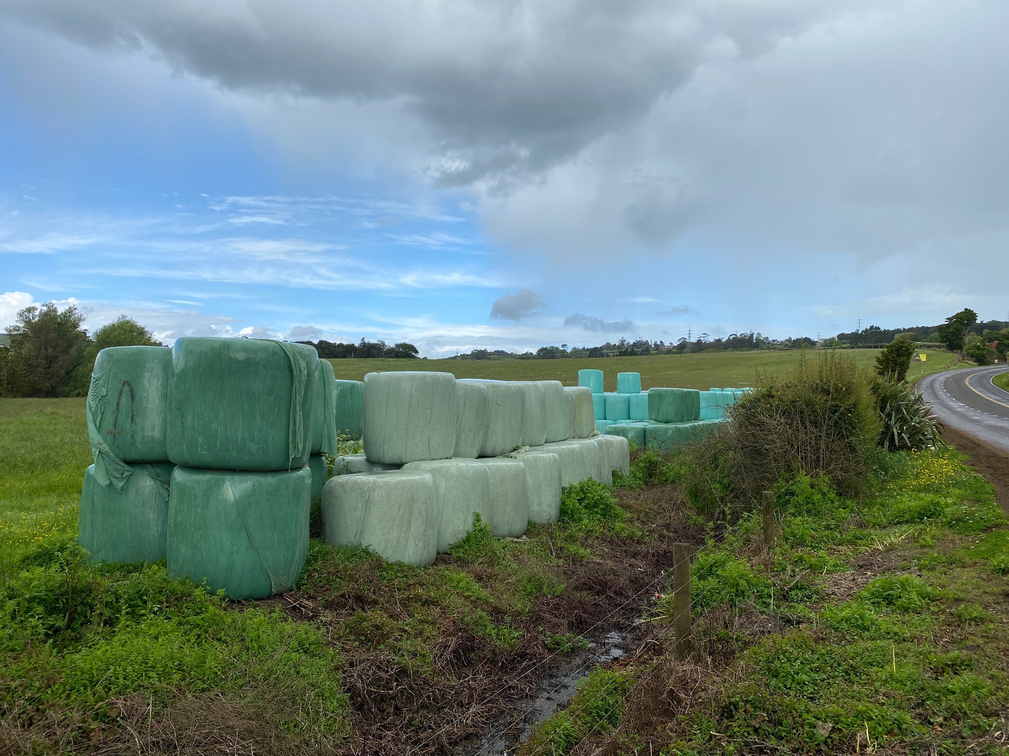 Haybales piled up in rural south Auckland.