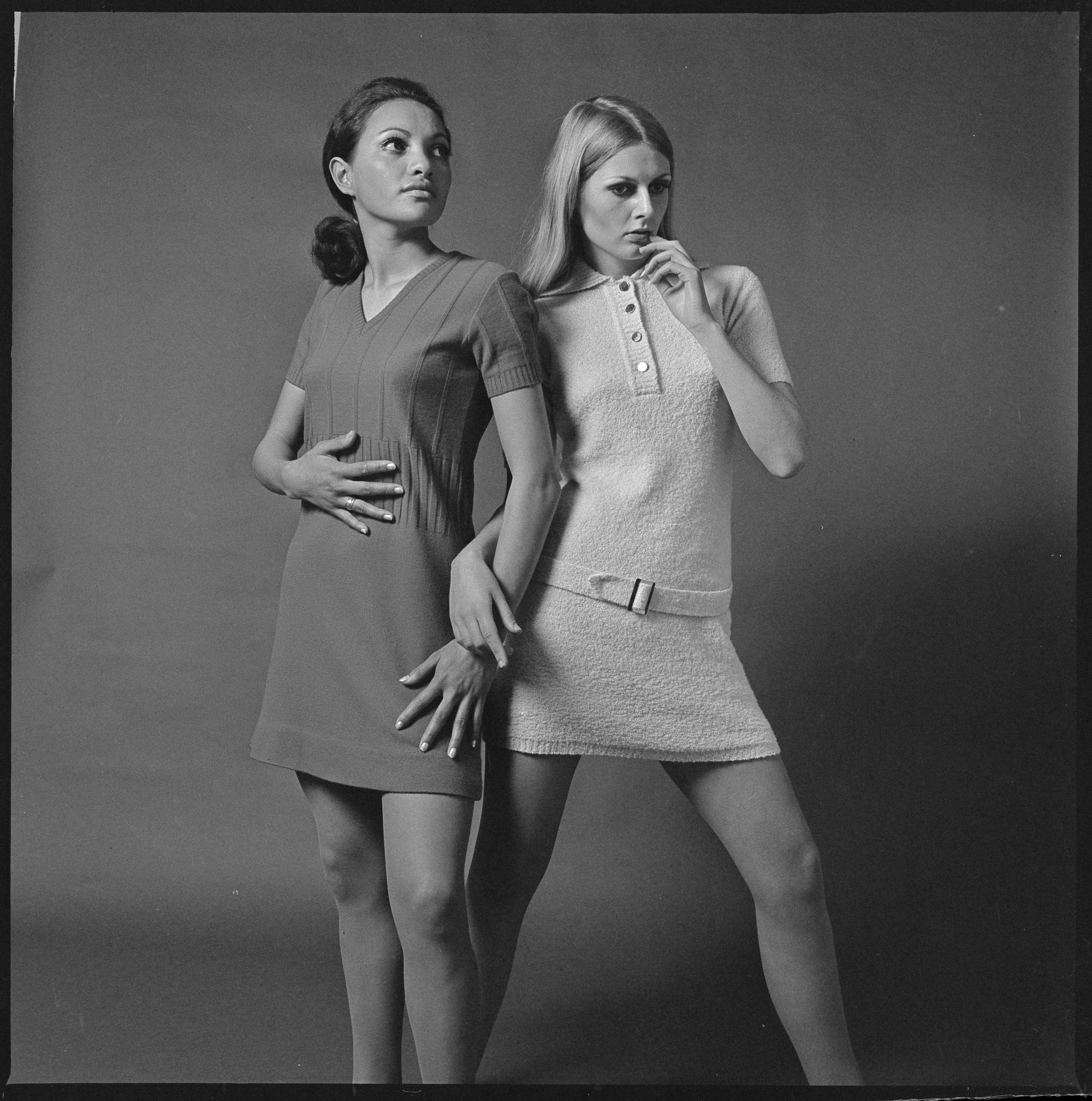 Noel Brotherston. Women modelling short-sleeved mini dresses, possibly Aotea Wakarua on the left, about 1960s. Auckland Libraries Heritage Collections, 1817-2139-09.
