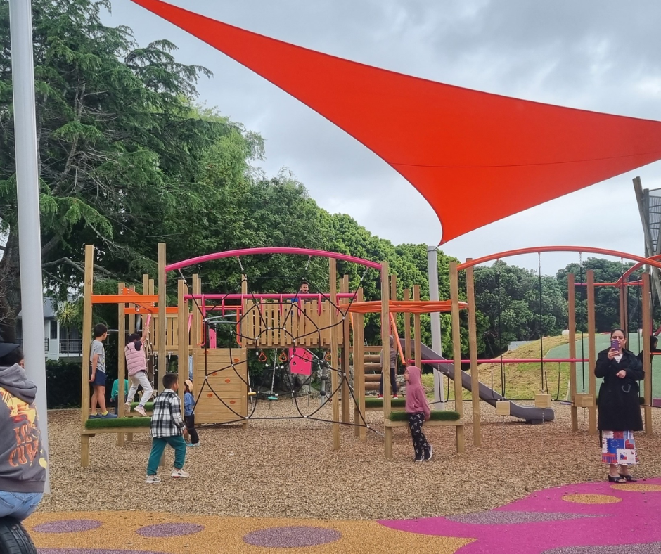 Kids playing on a playground. 