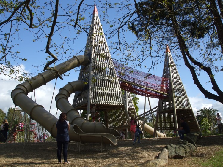Picture of conical playground structure with 2 tube slides coming off each side