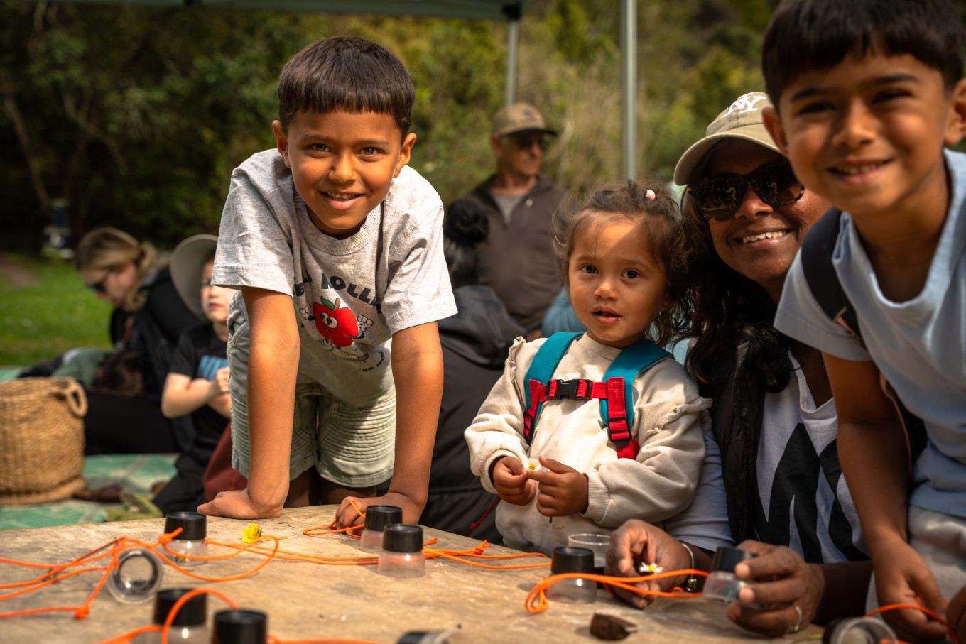 Kids learning about nature in a natural environment.