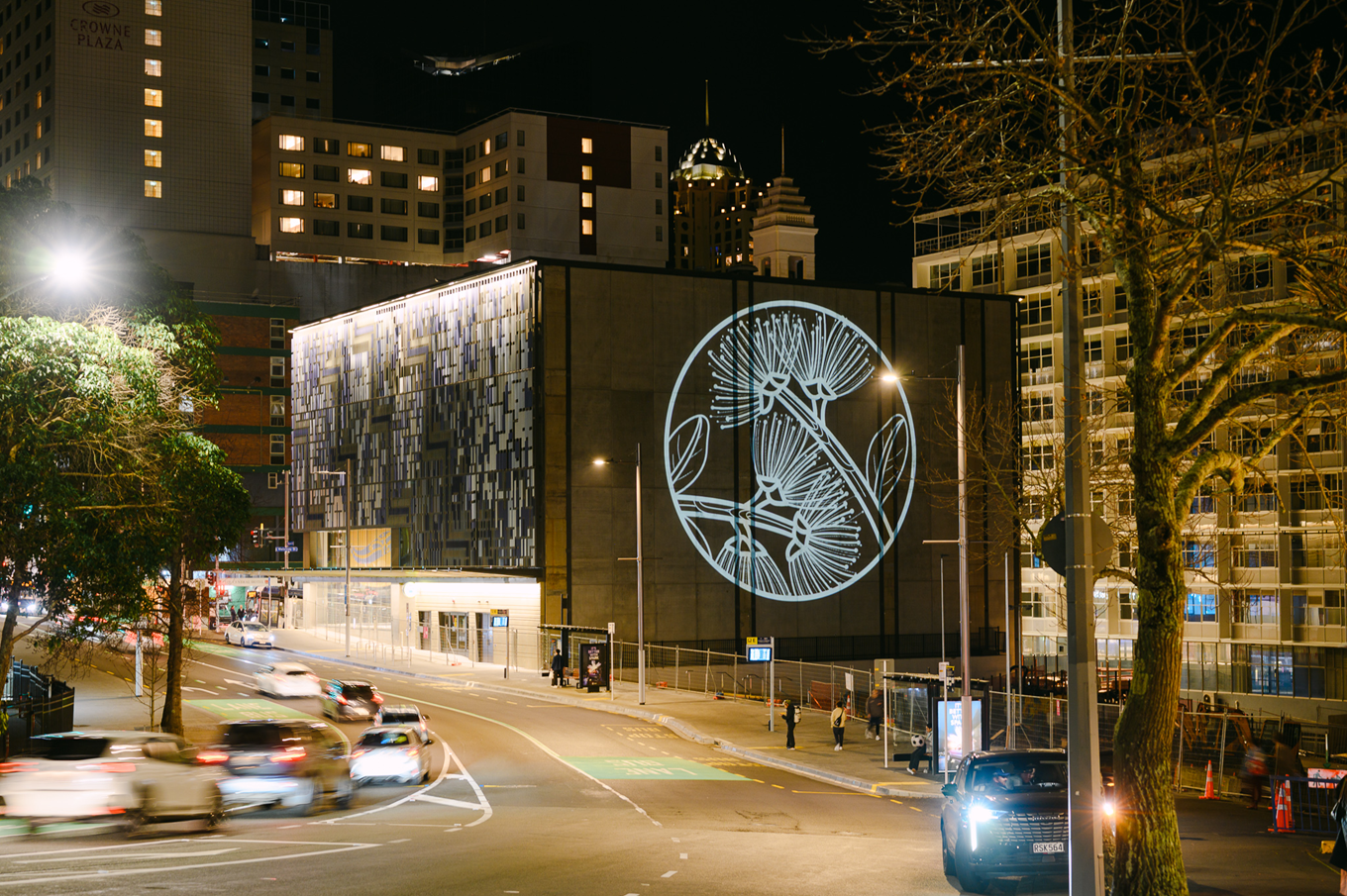 A light show shown on a local building wall. 