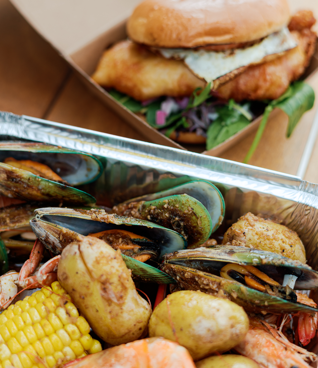 Māori style boil up placed on a tray to eat
