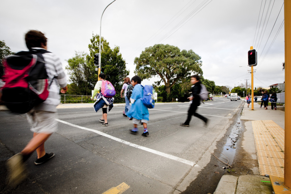 Blurred image of kids at crossing
