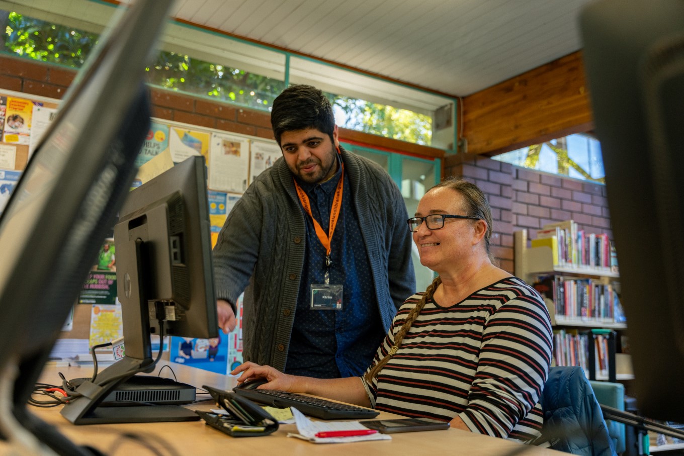 Siobhan Hope prefers to work at the library because she loves the community vibe and the helpful librarians.