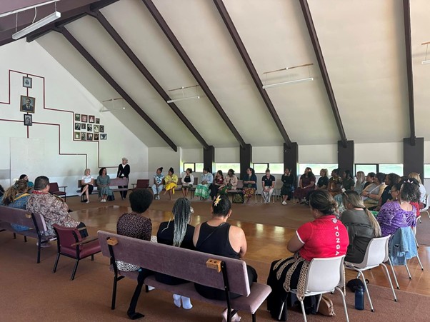 A community gathering in a local marae. 