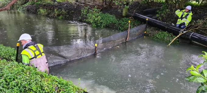 Amphibious dredge put to work at Waiatarua