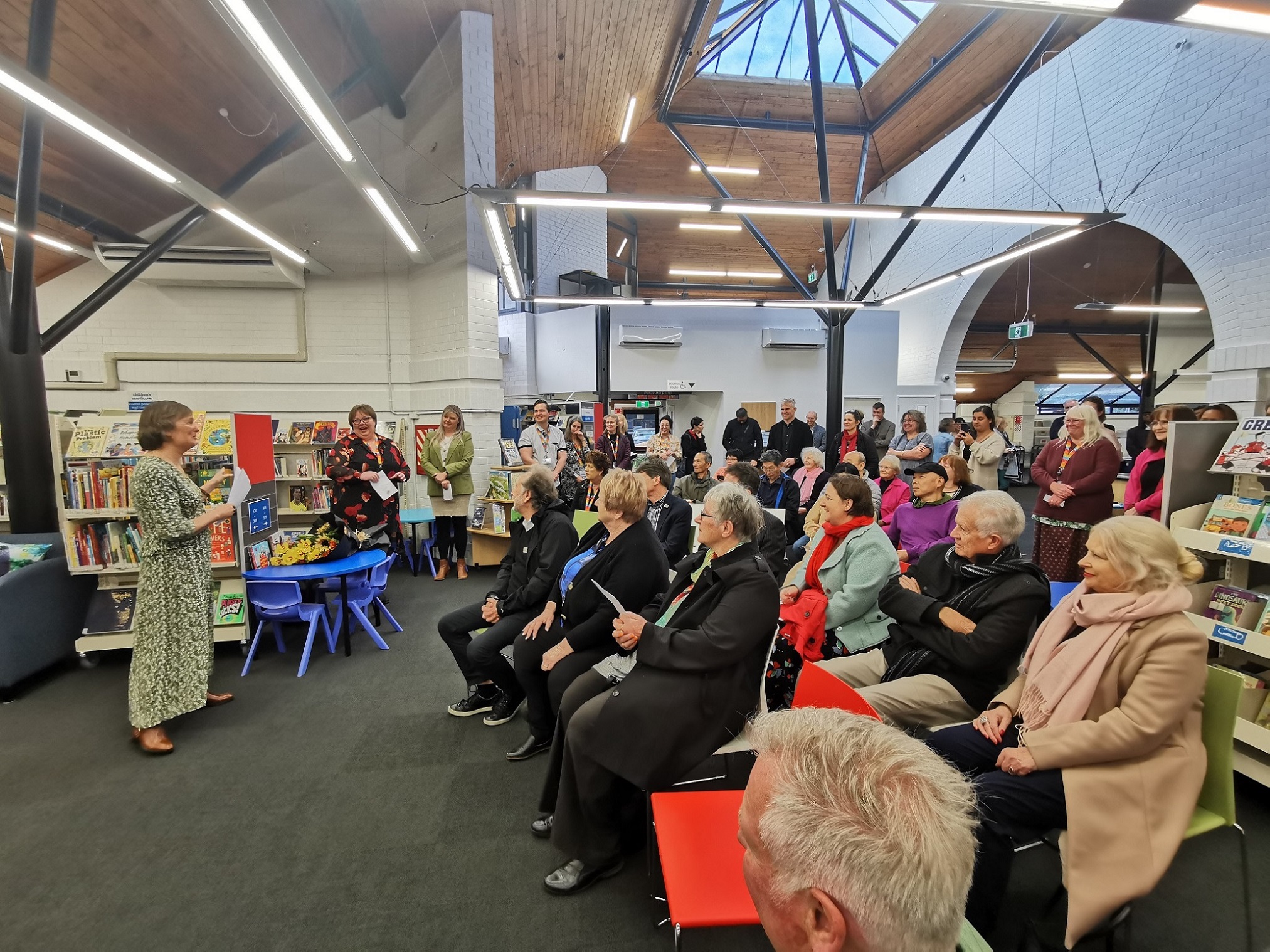 Elected members, library staff and patrons at the reopening of East Coast Bays Library.