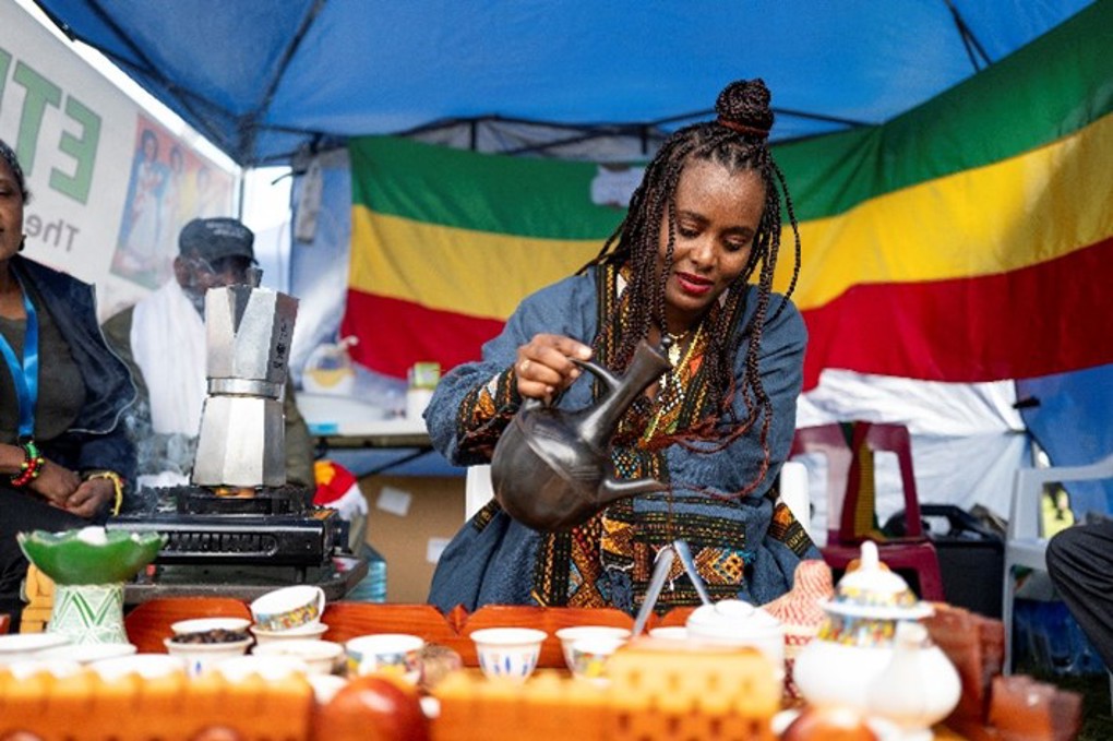 Local women with cups on display