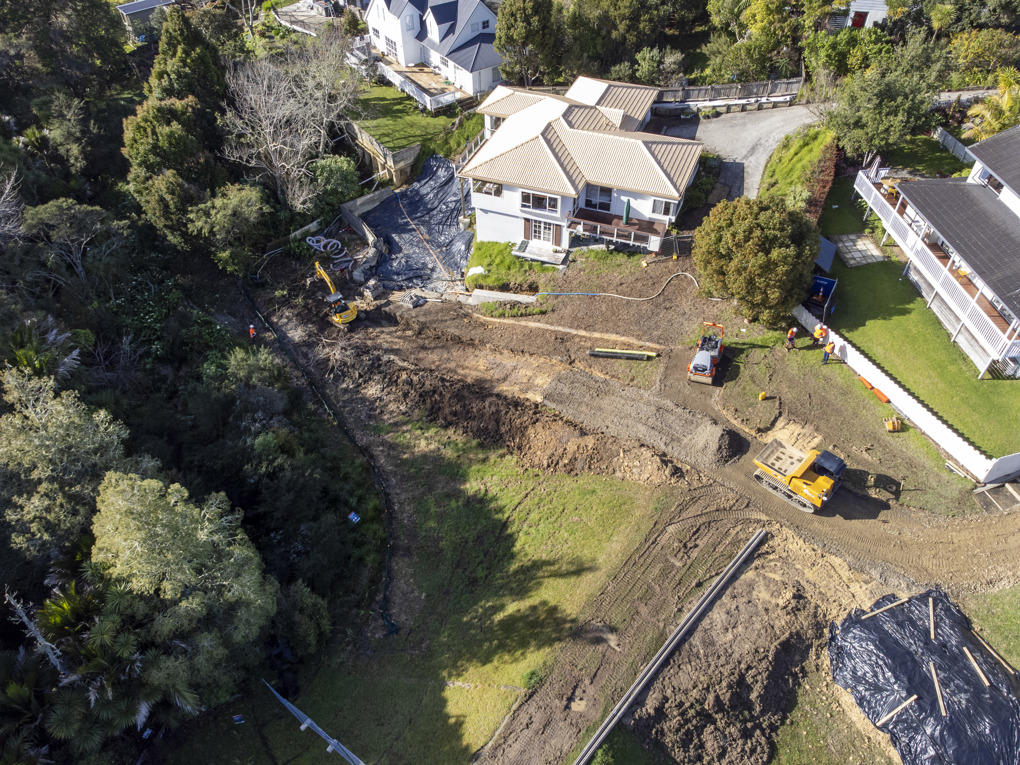 Permanent flood recovery repairs are underway behind Emlyn Place
