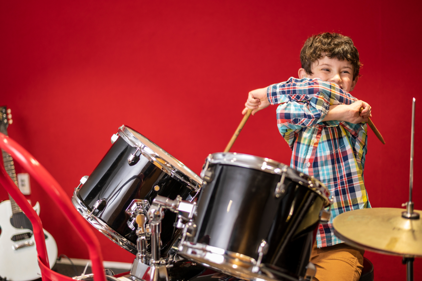 Nate on the drums at Raukatauri Music Therapy Centre