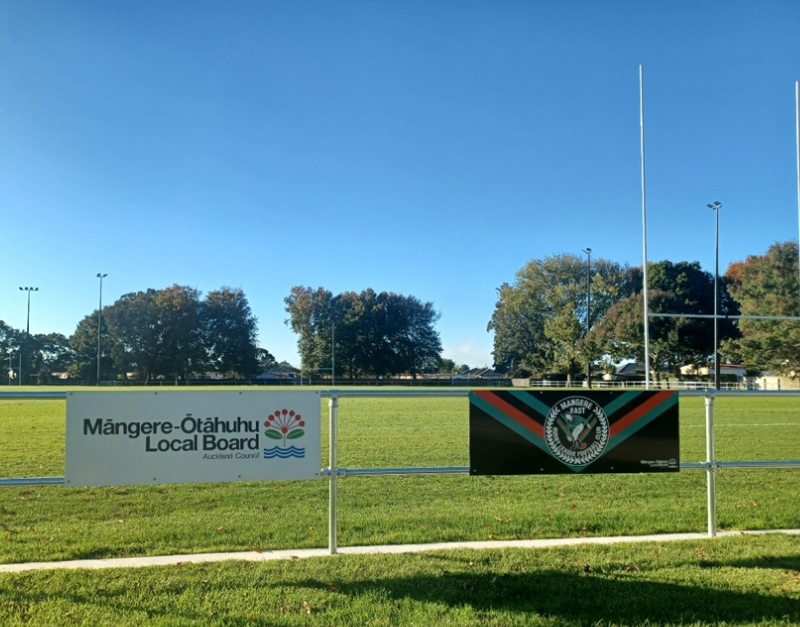 Sponsorship signs for the football field.