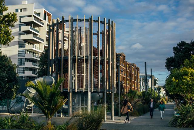 Picture of Daldy Street Park and people walking along the path beside it.