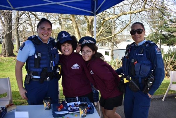 Police officers and school kids from the neighbourhood.