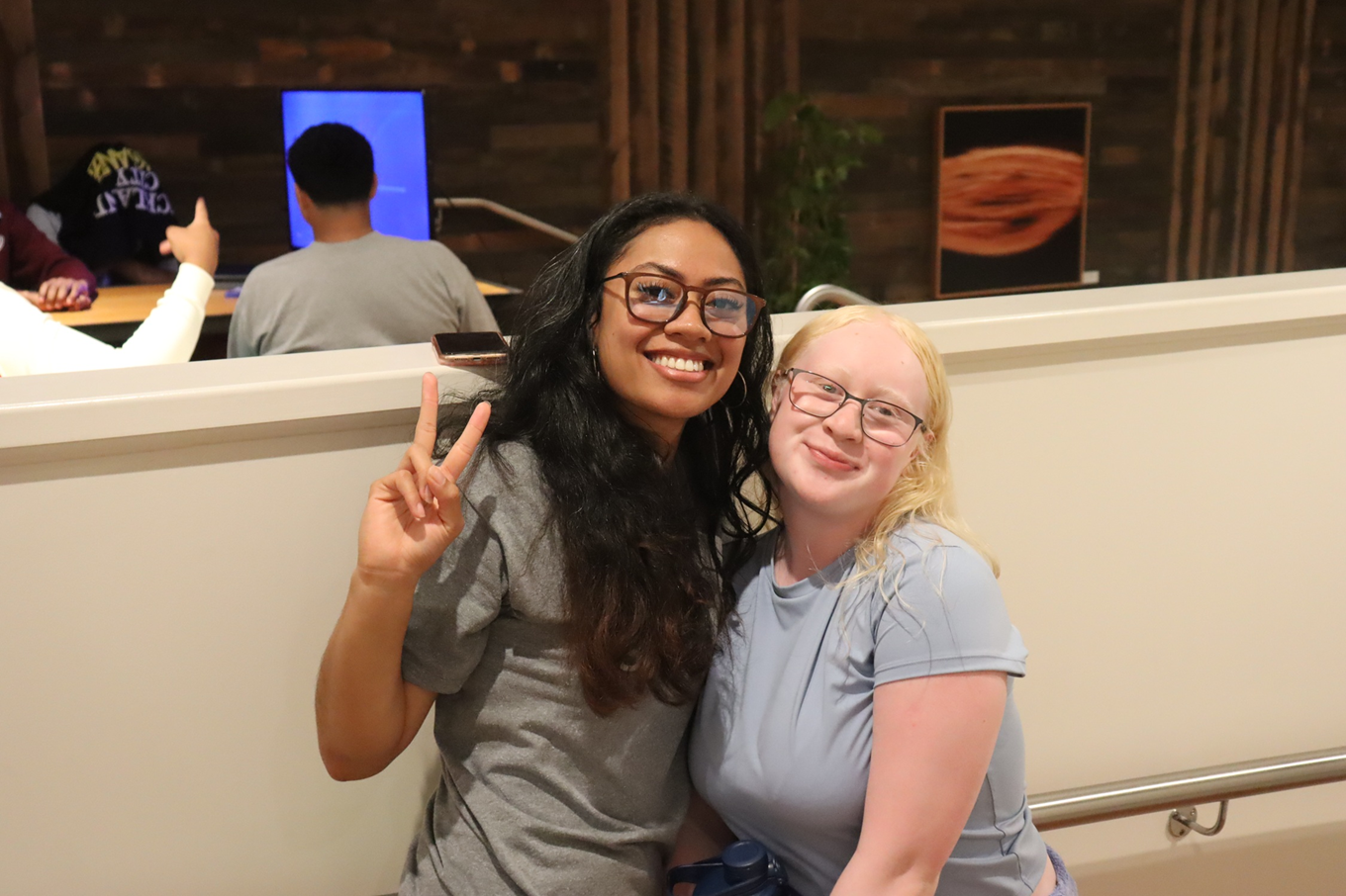 A women with a young teenage girl. 