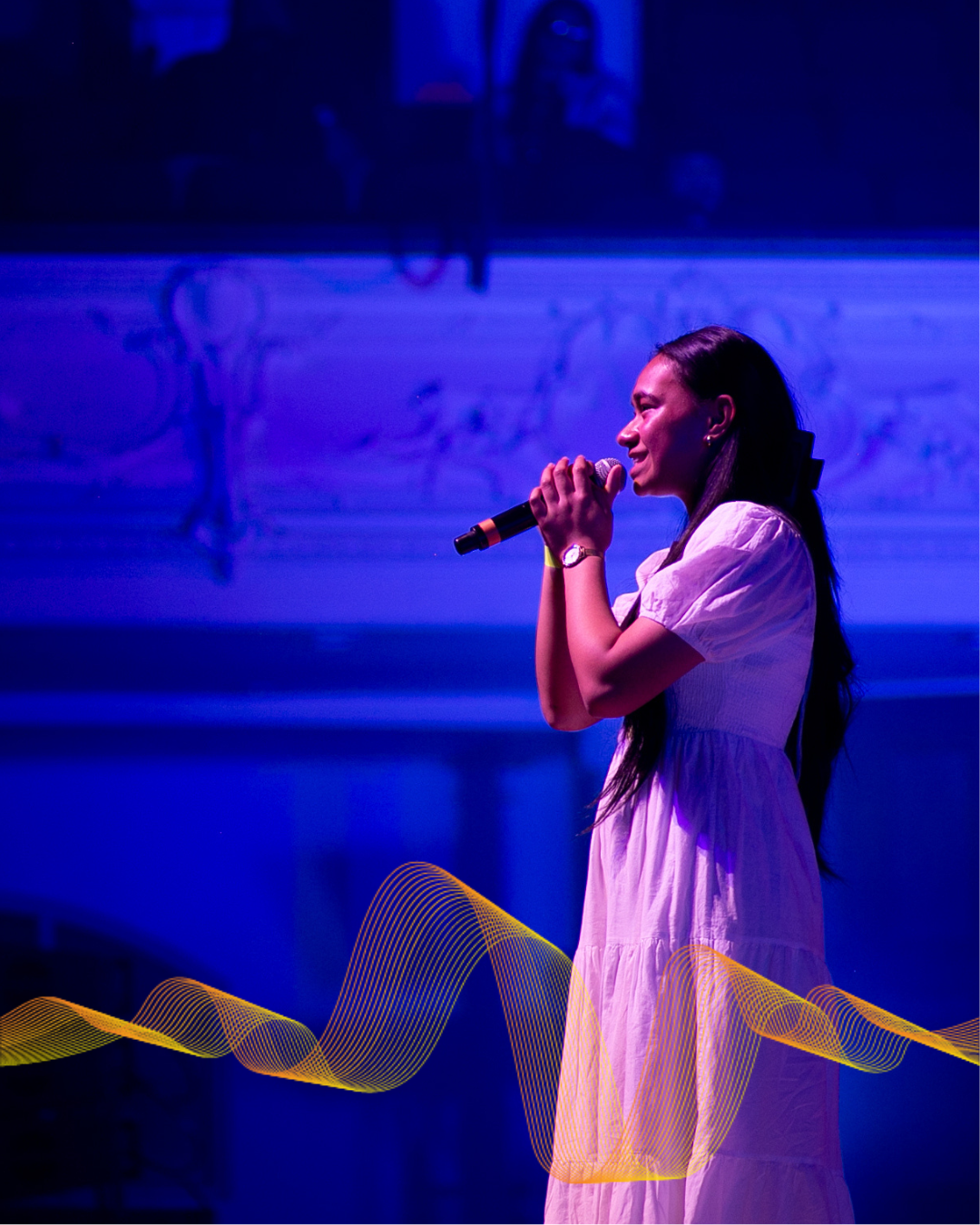 A girl performing on stage.