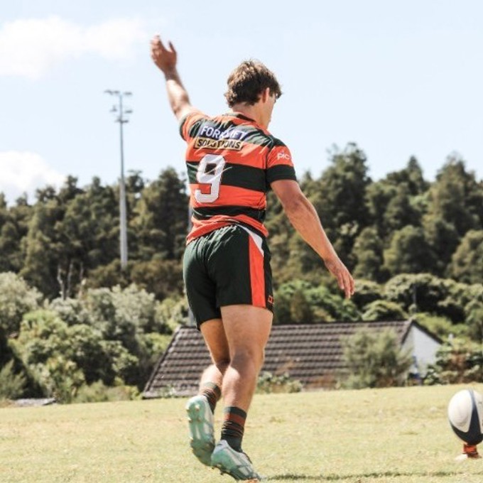 Rugby Player Going To Kick Ball