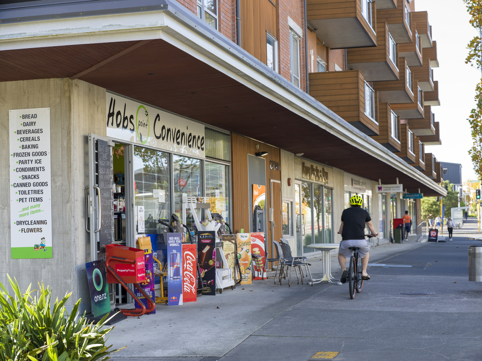 A local shop on a street. 